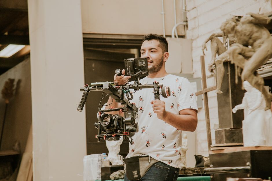 Wedding videographer filming a ceremony