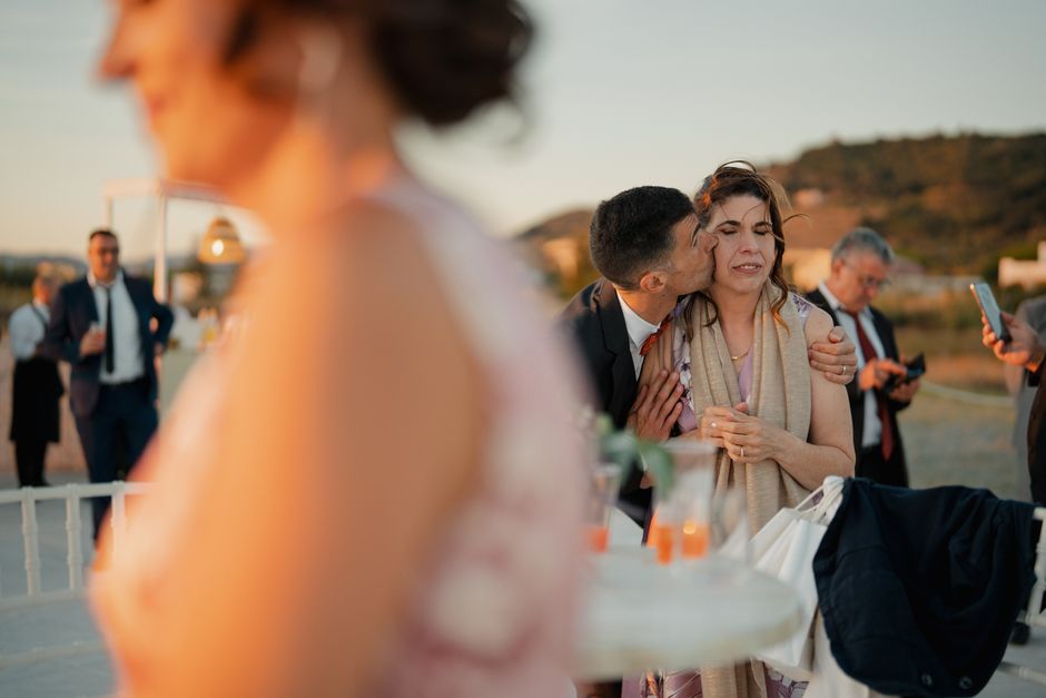 Emotional wedding guests watching a speech